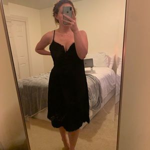 Black slip dress with lace detail